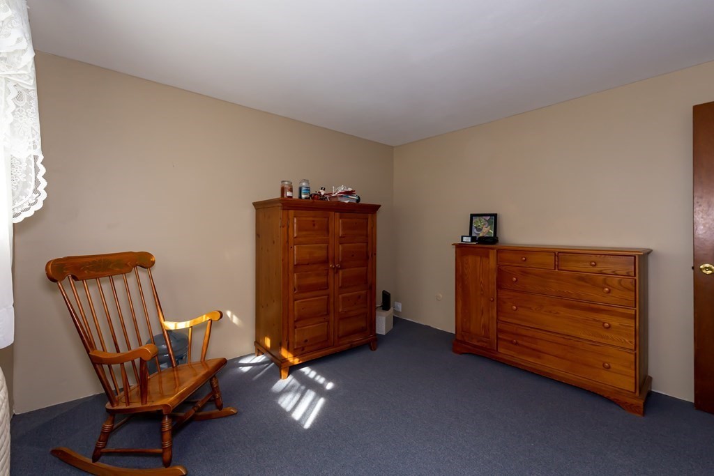 130 Old Ferry Road, Unit B Haverhill, MA 01830 - Photo 23 of 30 a view of a room with furniture and wooden floor