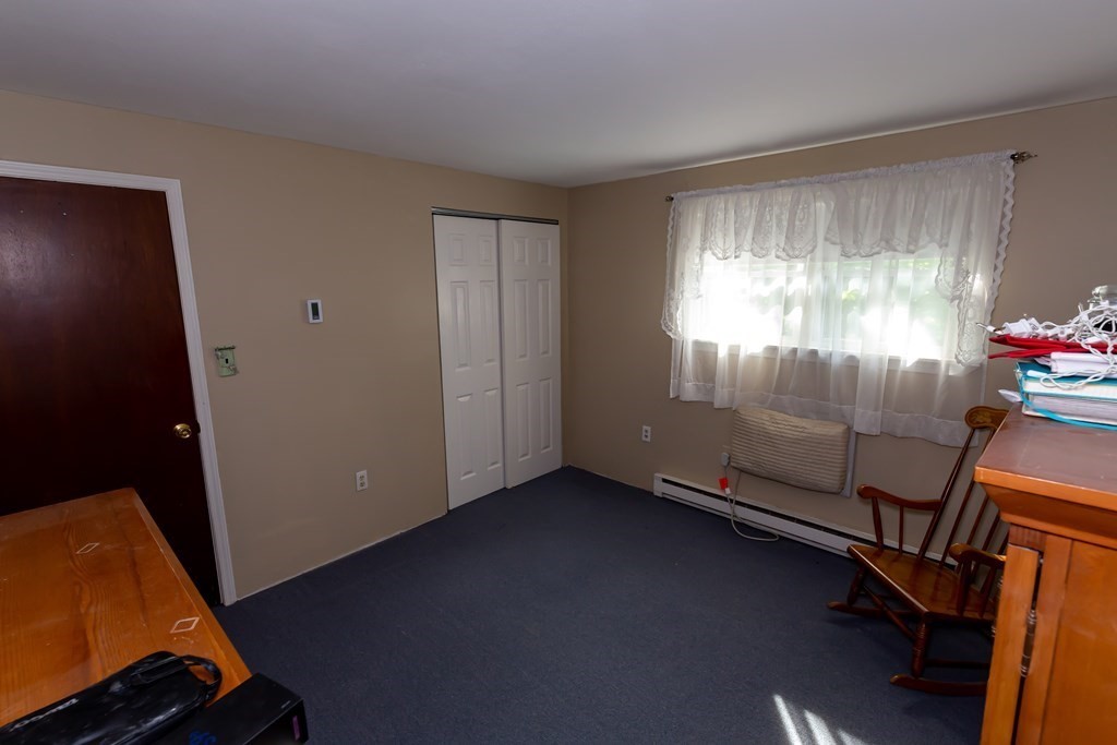 130 Old Ferry Road, Unit B Haverhill, MA 01830 - Photo 24 of 30 a room with furniture and window