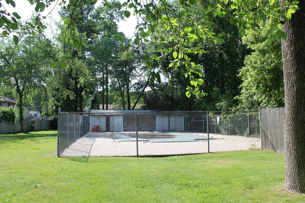 130 Old Ferry Road, Unit B Haverhill, MA 01830 - Photo 29 of 30 a view of a backyard with a small cabin