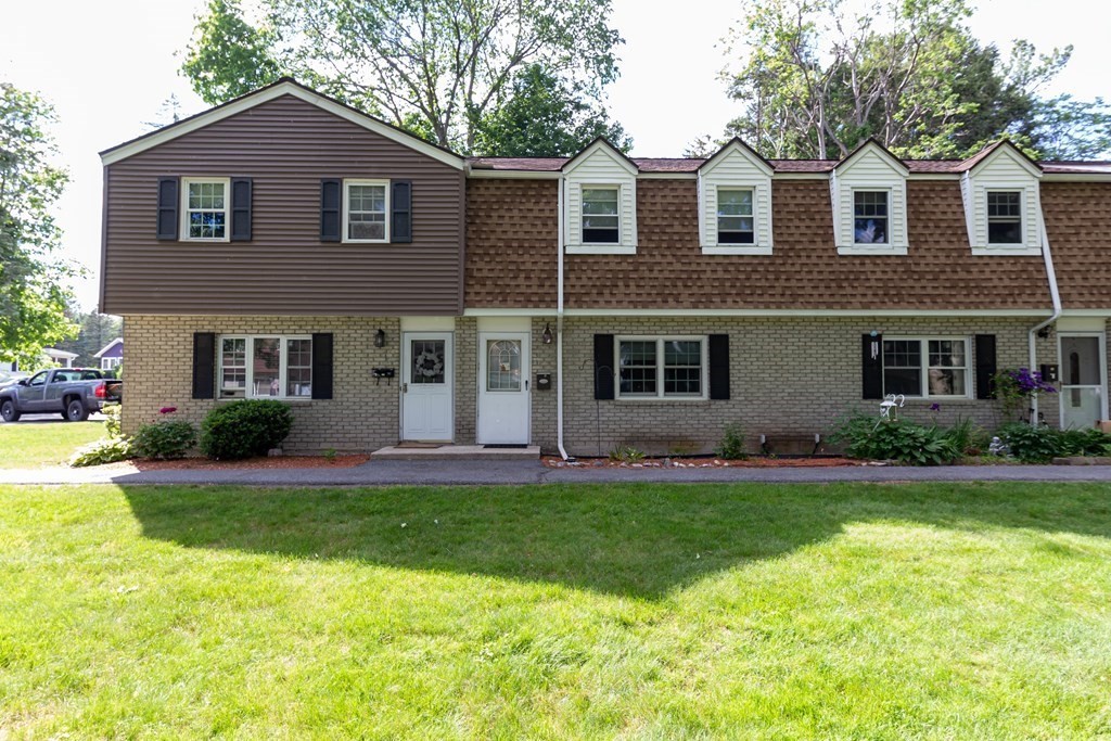 130 Old Ferry Road, Unit B Haverhill, MA 01830 - Photo 4 of 30 a front view of a house with a yard