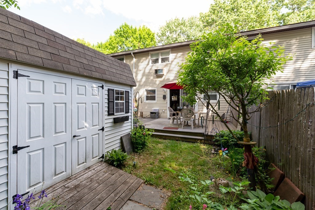 130 Old Ferry Road, Unit B Haverhill, MA 01830 - Photo 8 of 30 a front view of a house with a yard