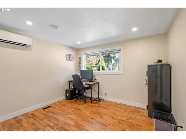 a workspace with furniture and window