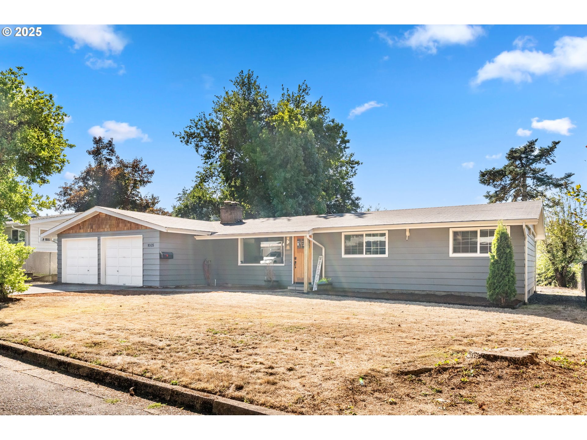 1035 South 11th Street Cottage Grove, OR 97424 - Photo 2 of 30 a view of house with yard