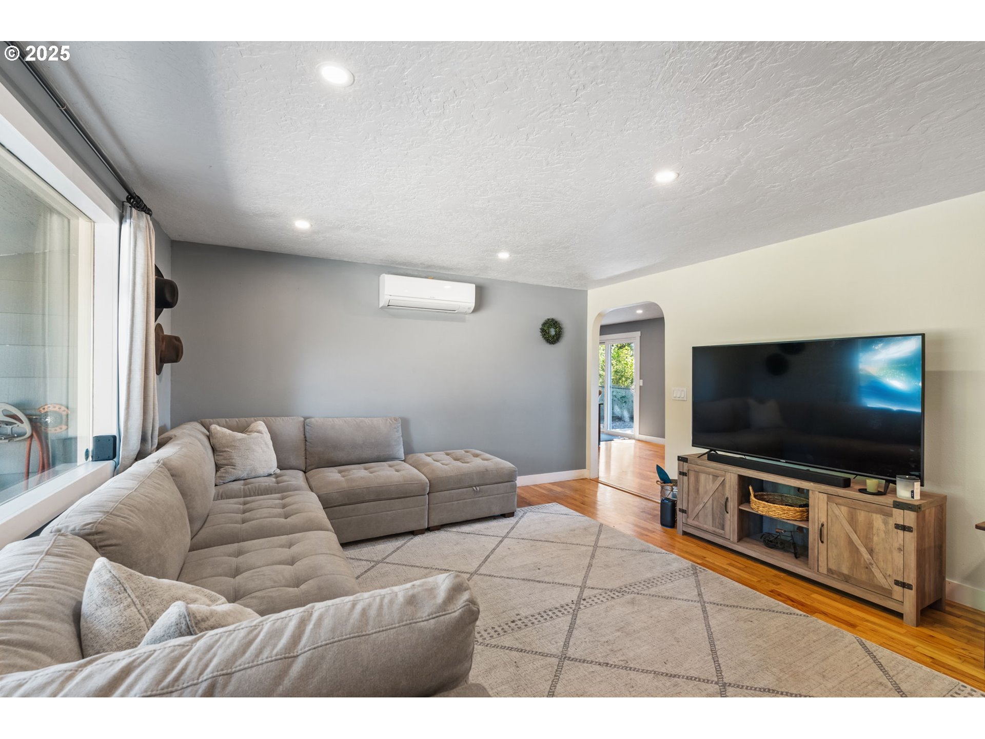 1035 South 11th Street Cottage Grove, OR 97424 - Photo 7 of 30 a living room with furniture and a flat screen tv