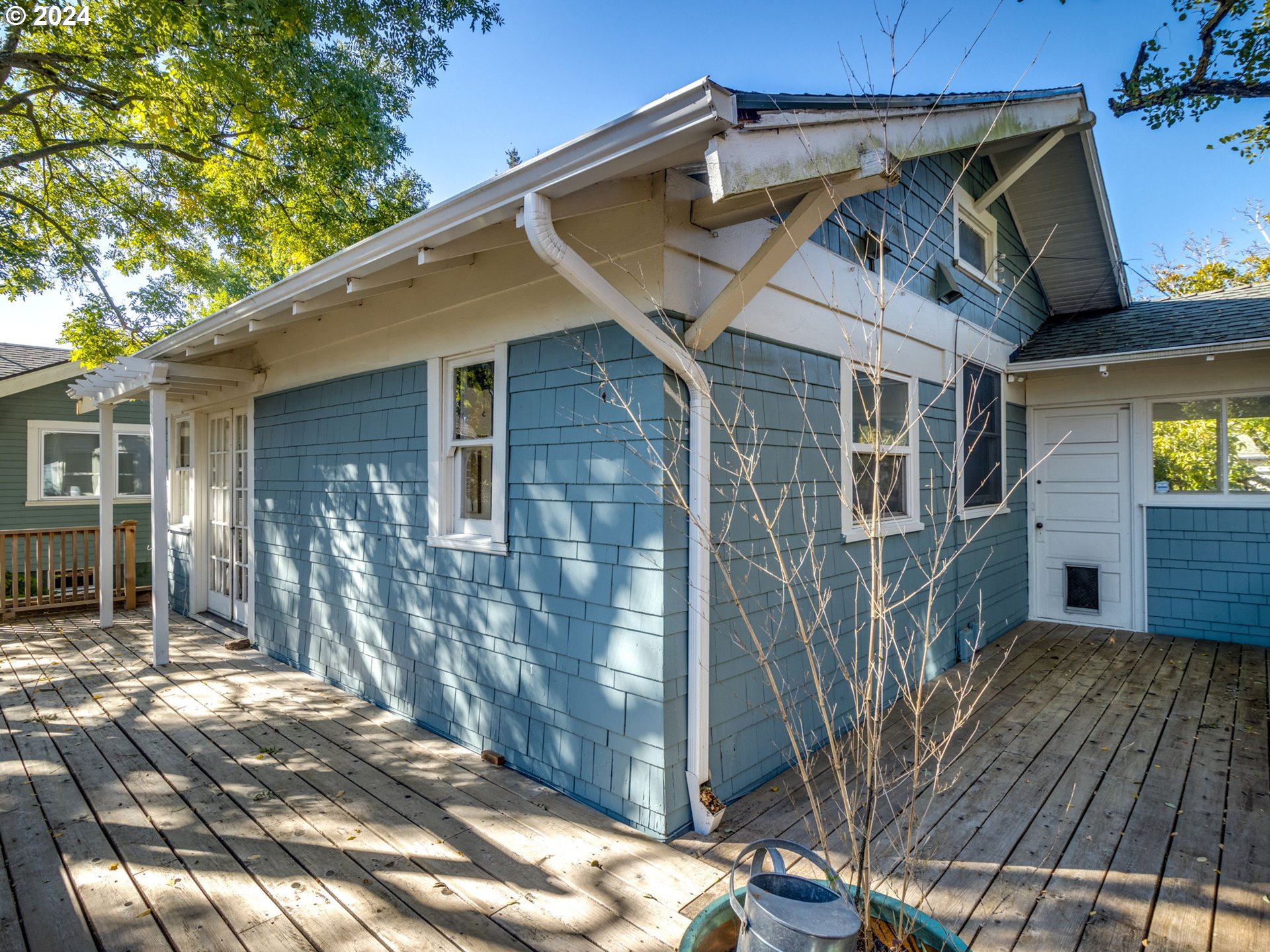 2834 Northeast 64th Avenue Portland, OR 97213 - Photo 21 of 27 a view of a house with wooden fence