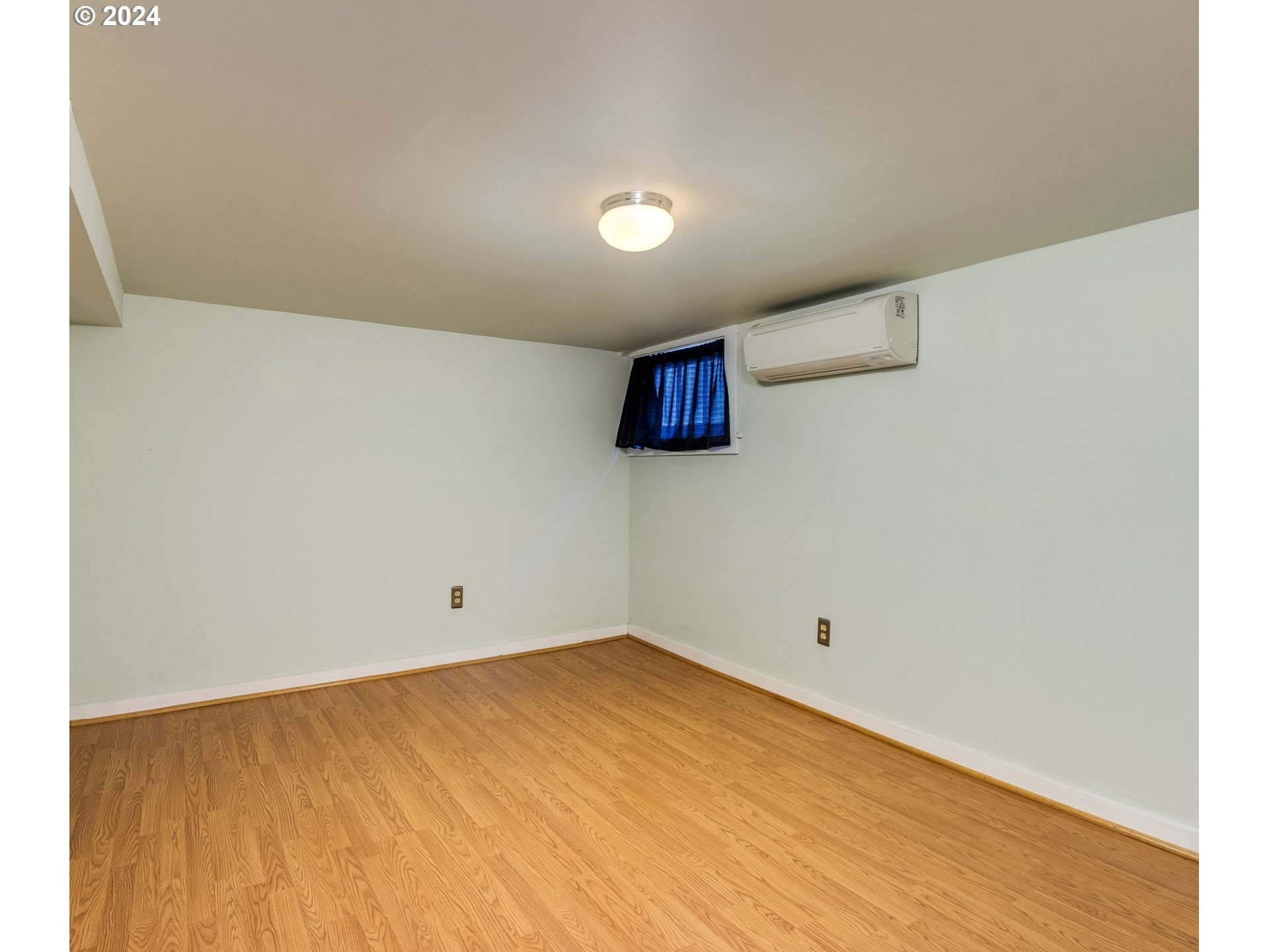 2834 Northeast 64th Avenue Portland, OR 97213 - Photo 24 of 27 a view of empty room with wooden floor