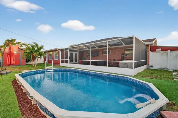 a view of a back yard of the house
