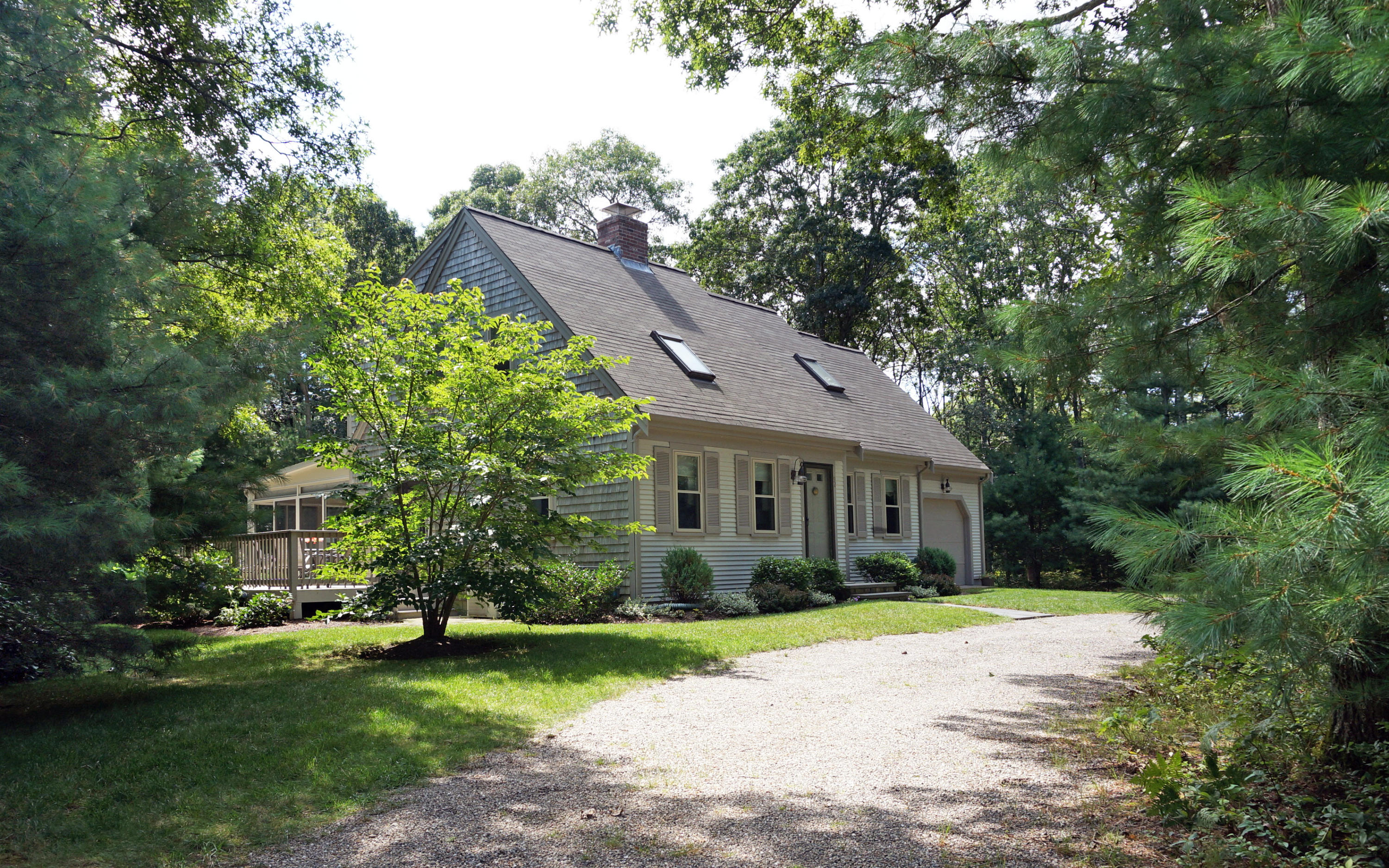 a view of a house with a garden