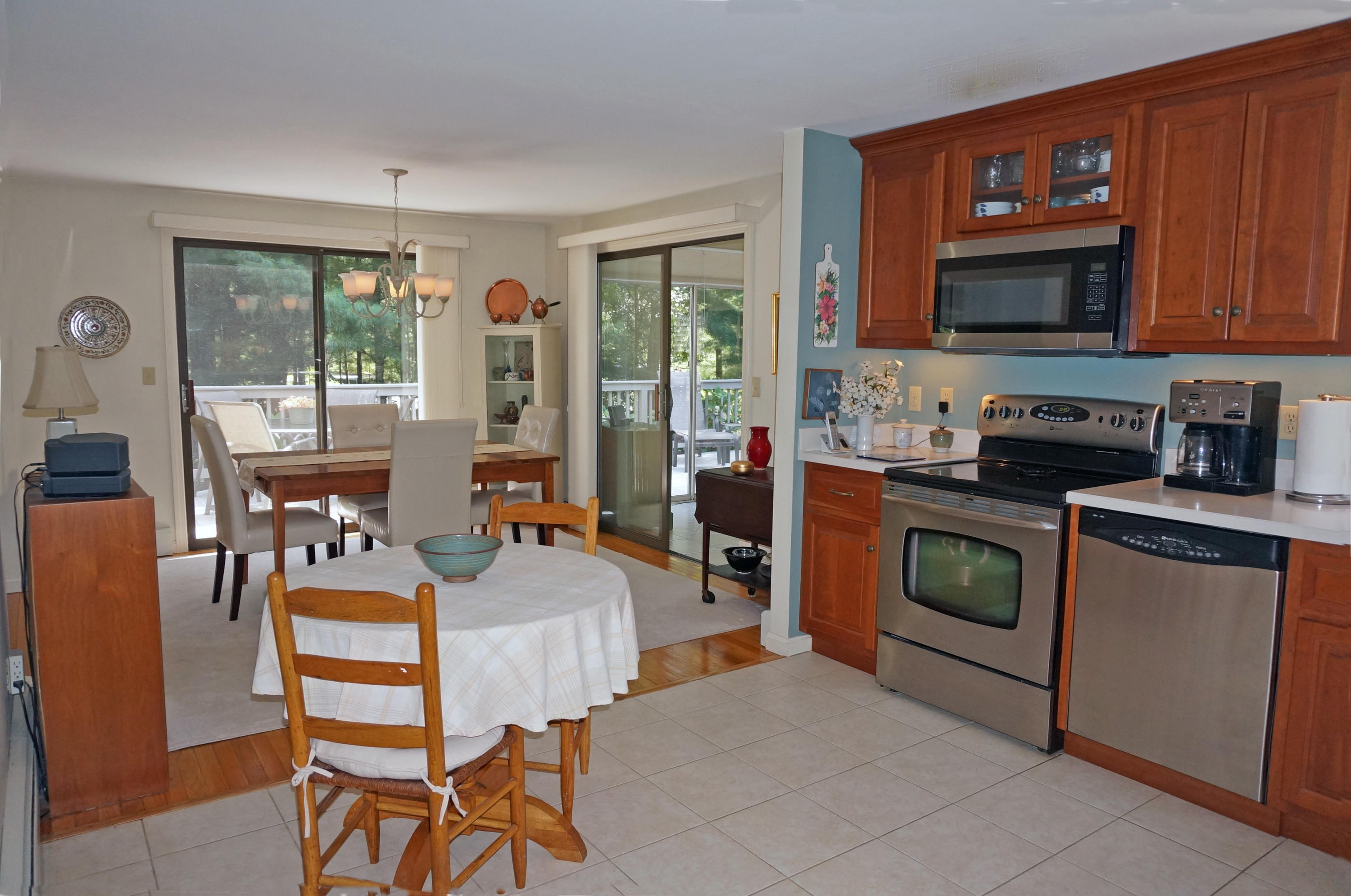 92 Nobadeer Road Centerville, MA 02632 - Photo 9 of 31 a bedroom with furniture a flat screen tv and a fireplace