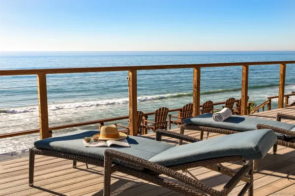 a view of swimming pool with outdoor seating