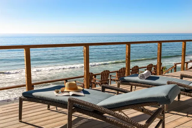 a view of swimming pool with outdoor seating