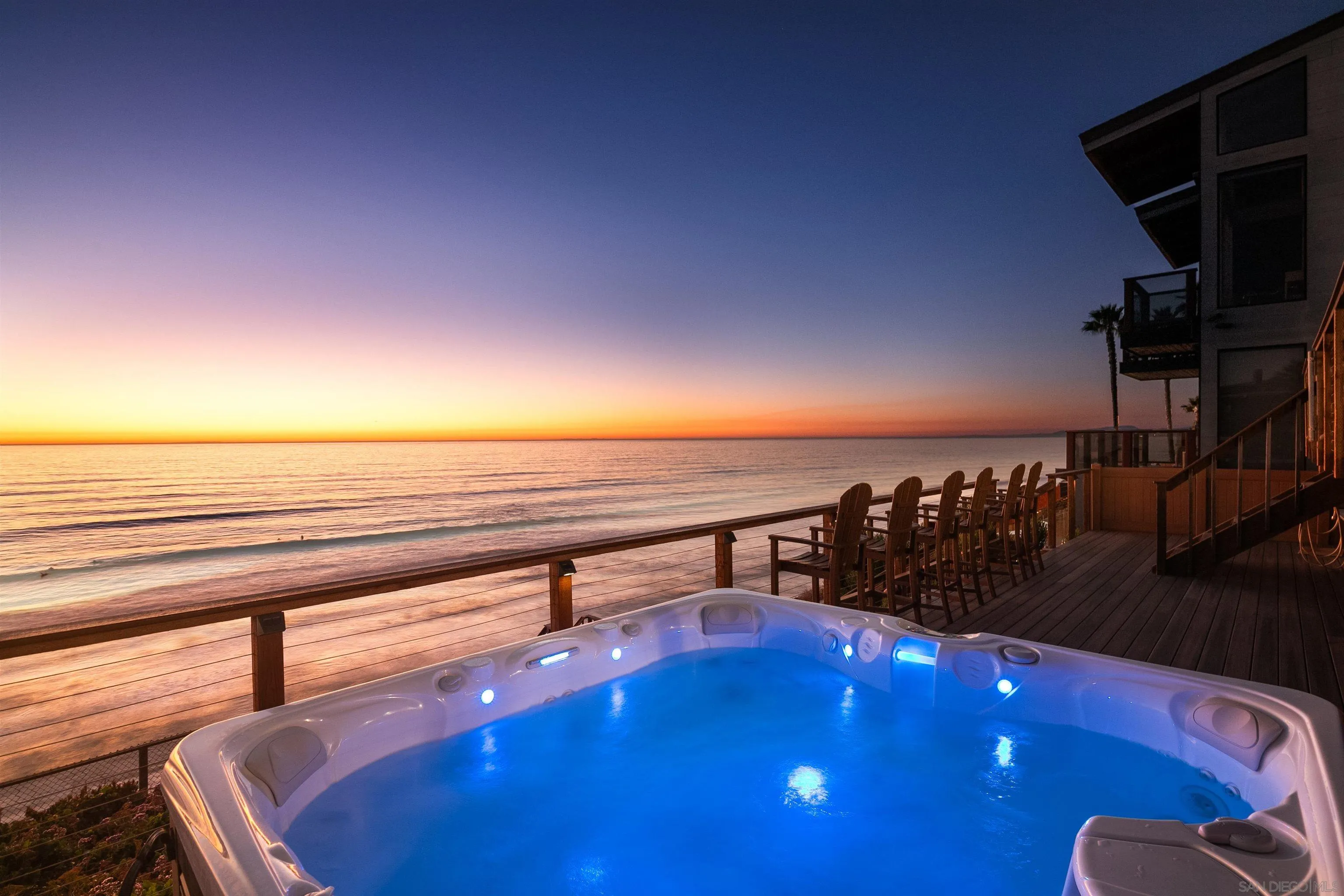 1680 Neptune Avenue Encinitas, CA 92024 - Photo 2 of 54 a view of a chairs and table on the wooden floor