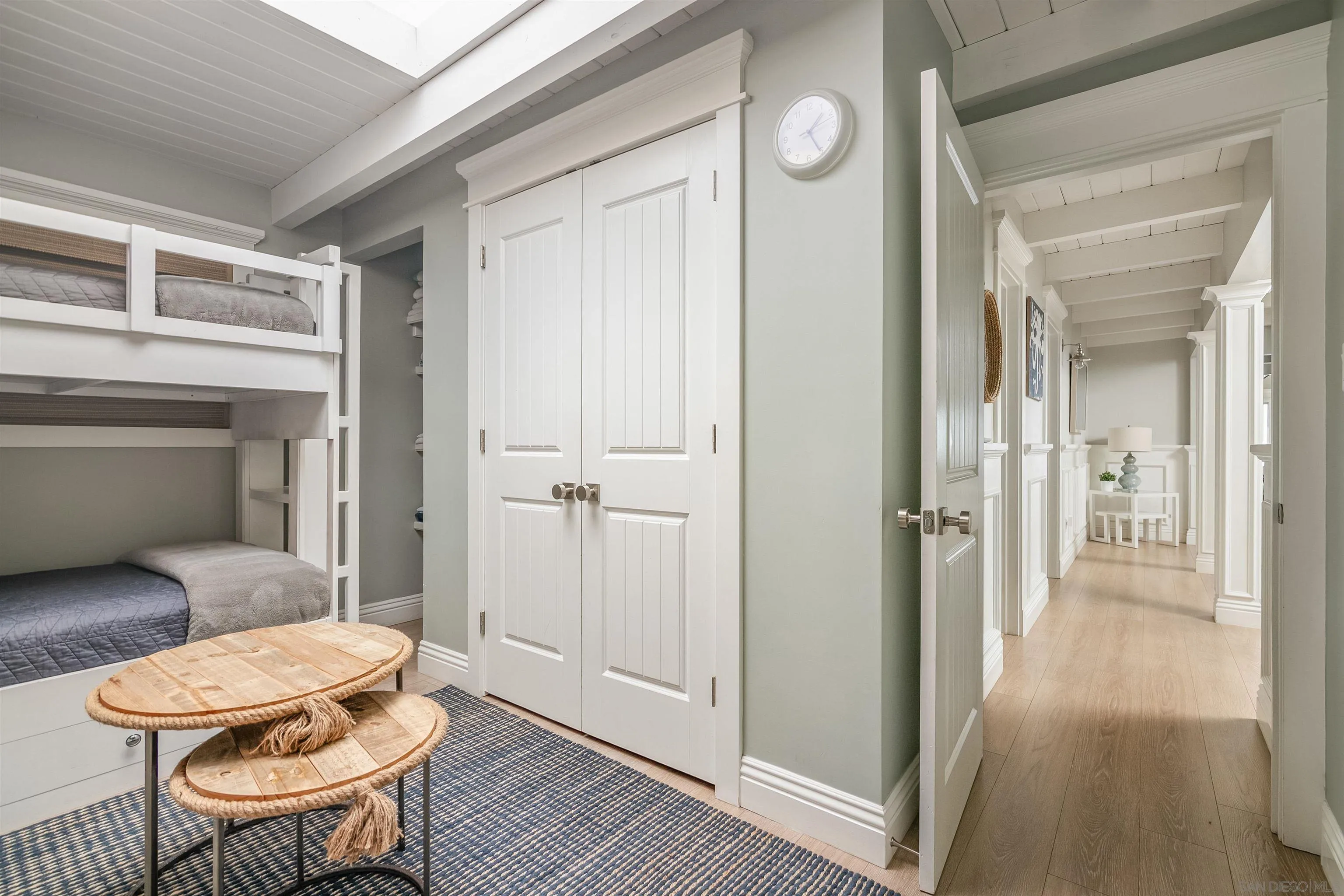 1680 Neptune Avenue Encinitas, CA 92024 - Photo 29 of 54 a bathroom with a toilet a sink and a mirror