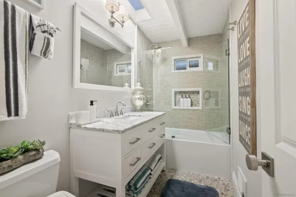 a large white bed in a white room