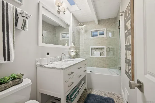 a large white bed in a white room