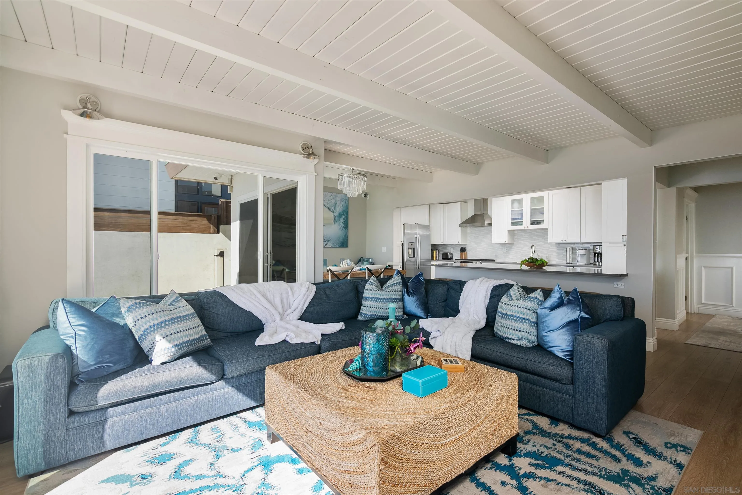 1680 Neptune Avenue Encinitas, CA 92024 - Photo 40 of 54 a living room with furniture and view of kitchen