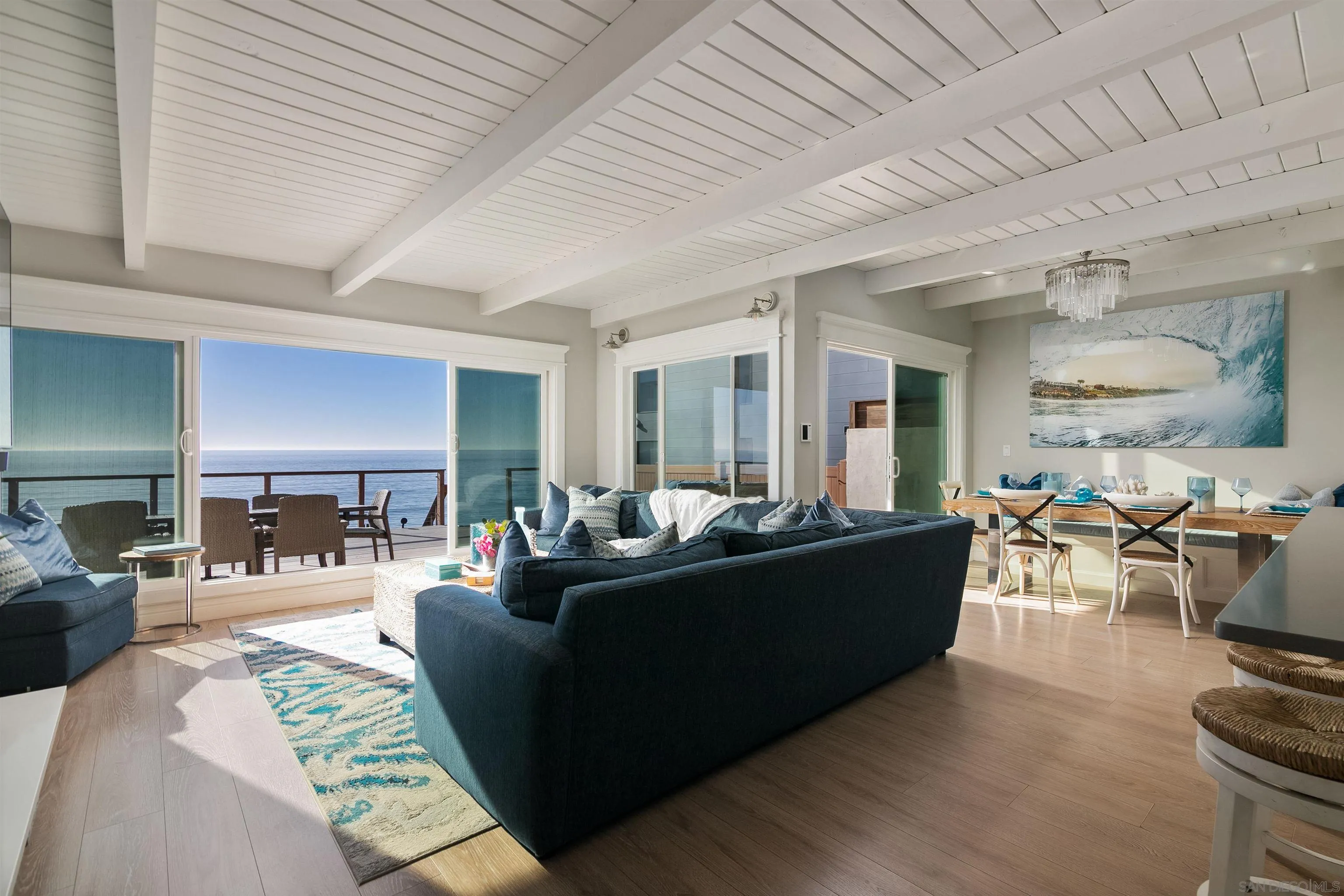 1680 Neptune Avenue Encinitas, CA 92024 - Photo 42 of 54 a living room with furniture and a wooden floor