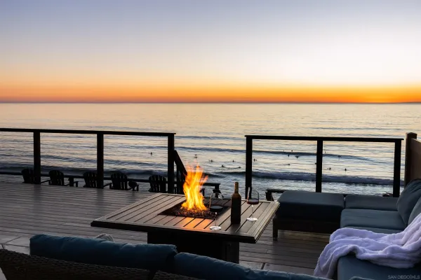 a view of a balcony with chairs