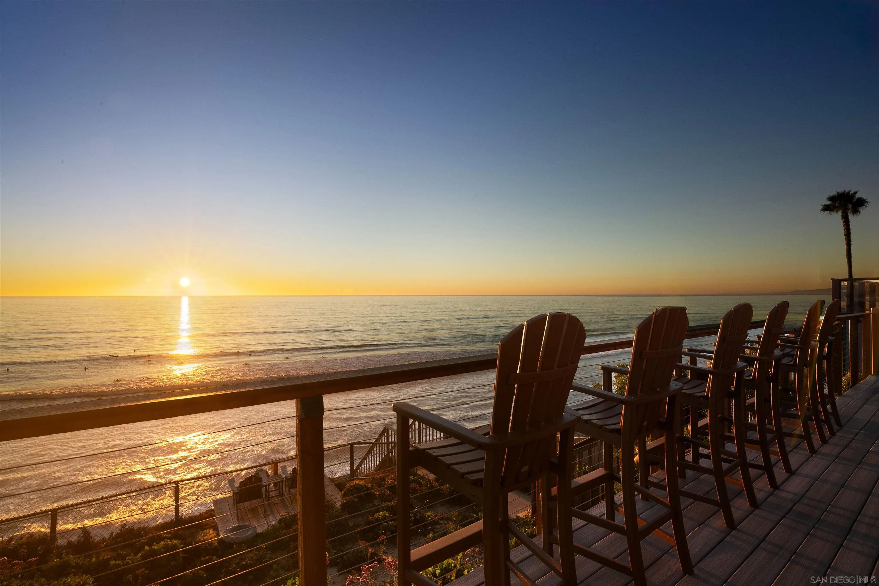 1680 Neptune Avenue Encinitas, CA 92024 - Photo 8 of 54 a view of a chairs and table on the terrace