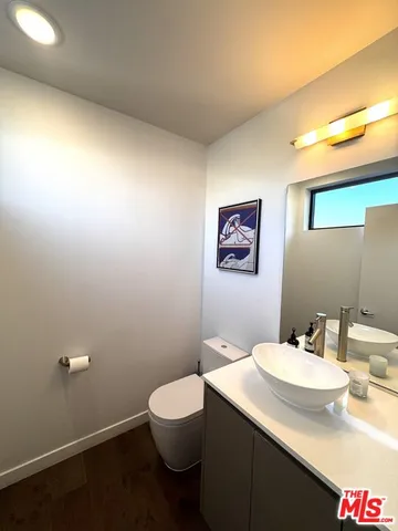 a bathroom with a sink and a toilet