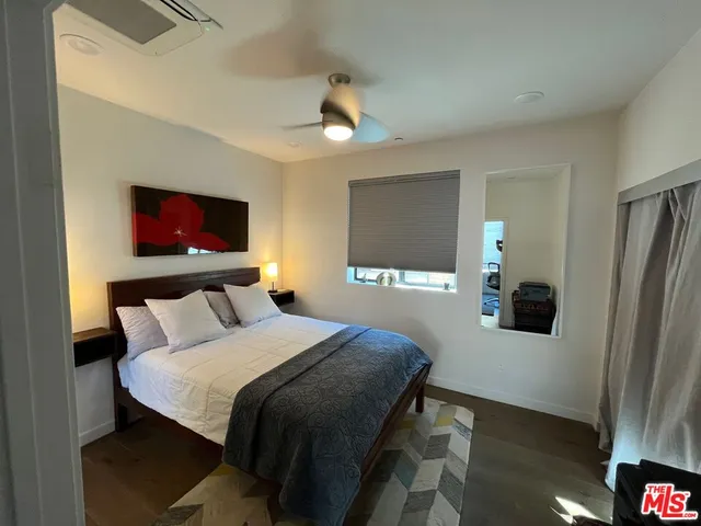 a room with a chair and air hockey table