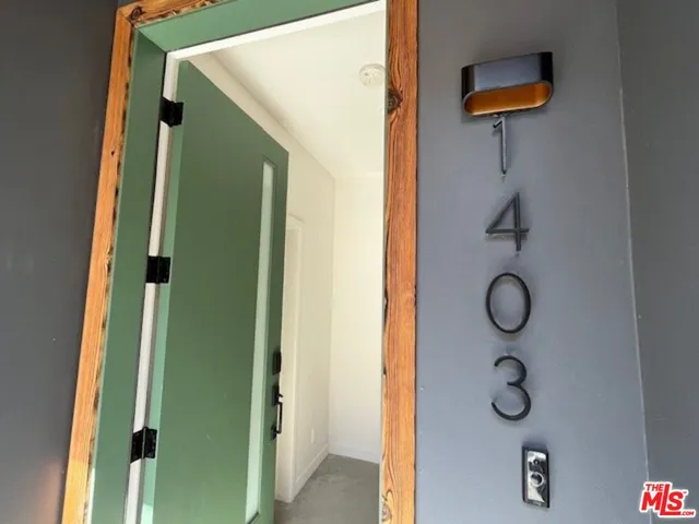 a bathroom with a shower and a mirror