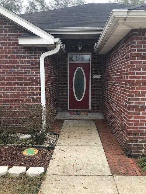 107 Kyle Lane Crestview, FL 32539 - Photo 24 of 25 a view of a pathway of a house