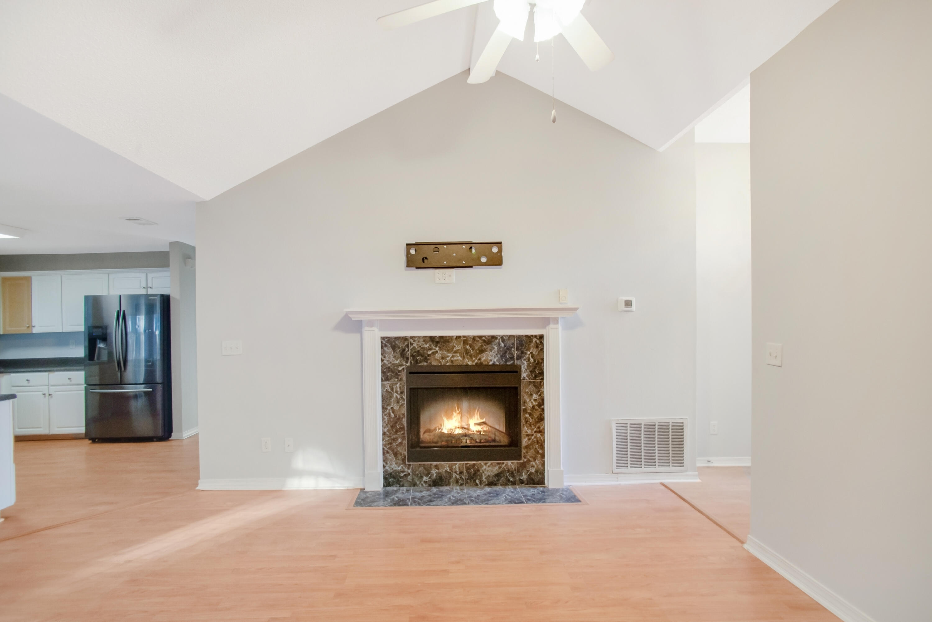 107 Kyle Lane Crestview, FL 32539 - Photo 3 of 25 a living room with a fireplace