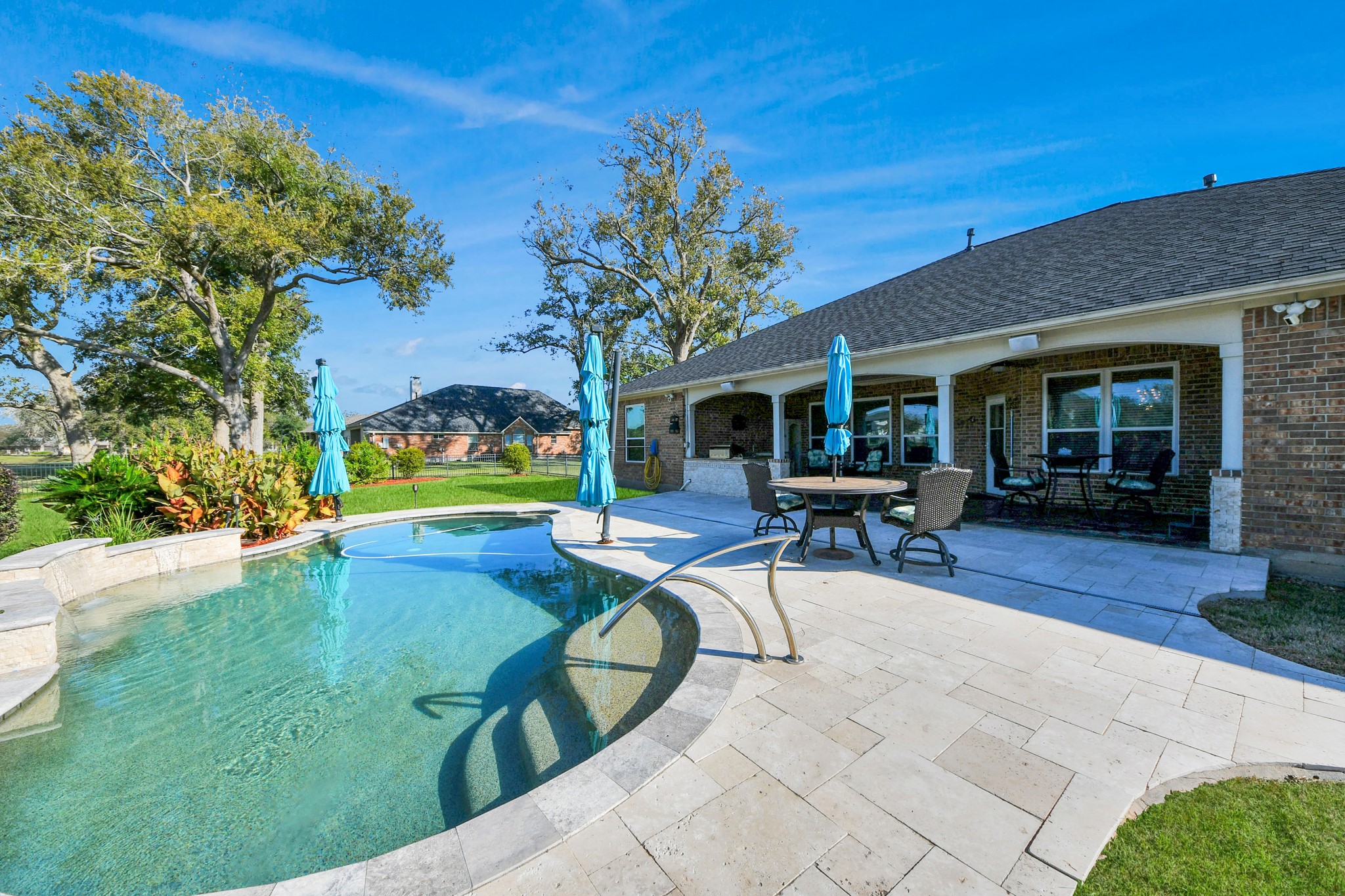 3511 River Bend Drive Rosenberg, TX 77471 - Photo 36 of 50 Sparkling pool featuring a cascade fountain and stunning views.