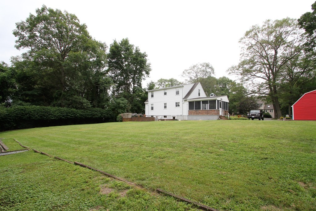 43 Higley Road Ashland, MA 01721 - Photo 8 of 28 a house view with a garden space