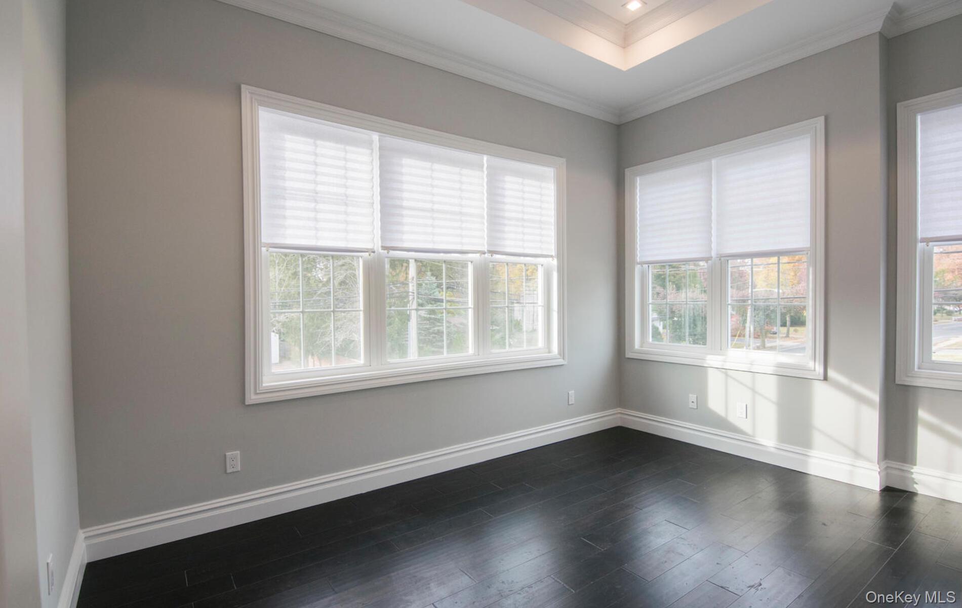 2 Seaman Road Glen Cove, NY 11542 - Photo 10 of 17 Primary bedroom with hardwood floors, 11 ft ceilings.