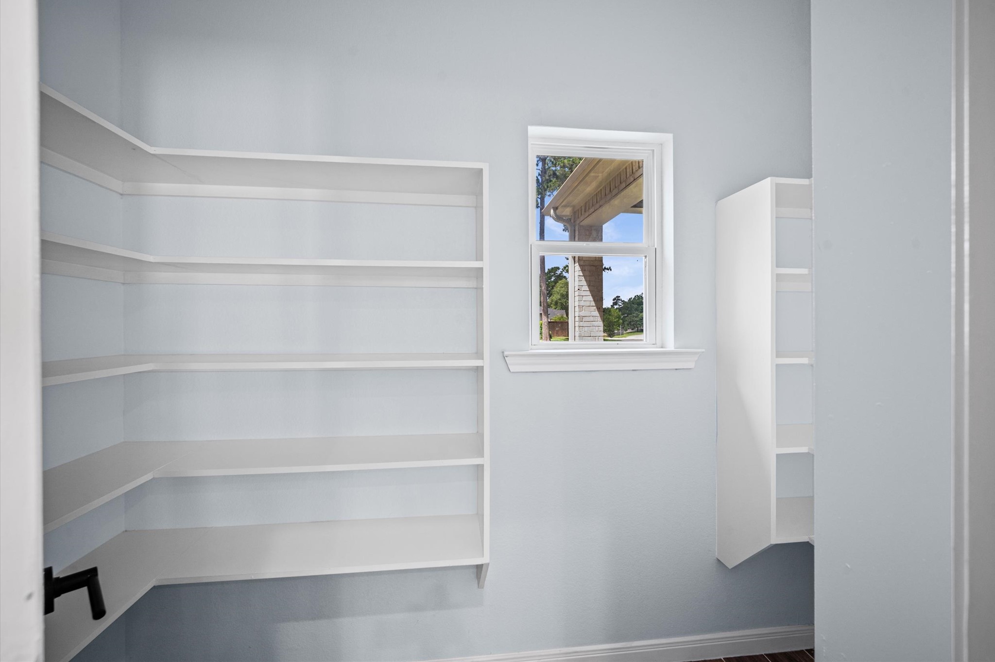 7 Pilot Point Conroe, TX 77304 - Photo 13 of 47 a view of an empty room with a window