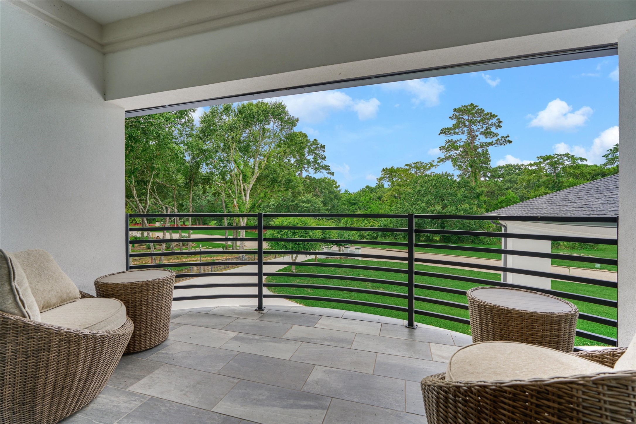 1907 Woerner Road Houston, TX 77090 - Photo 39 of 50 Panoramic views from the private balcony of second floor primary suite.