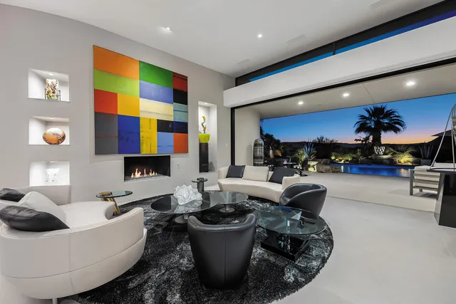 a view of a house with a yard and a garage