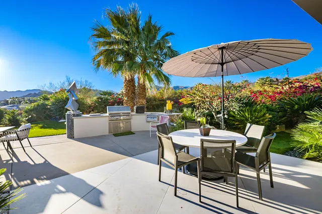 a view of a workspace with furniture