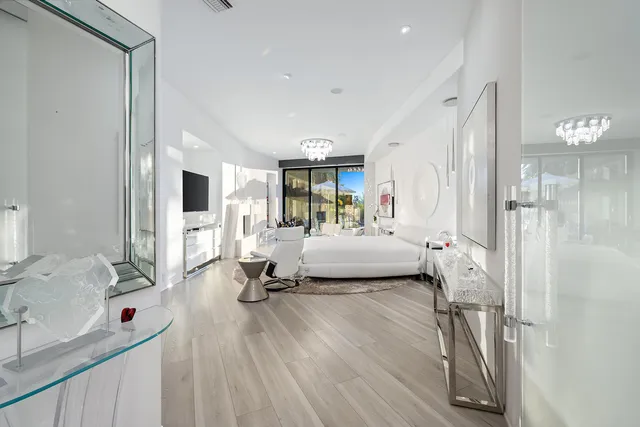 a view of a chairs and table in the patio