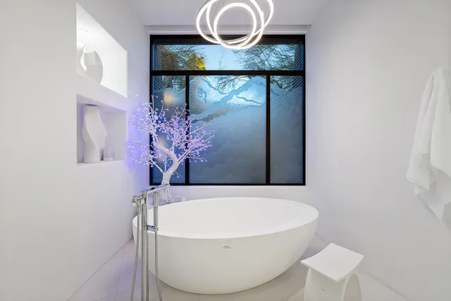 a view of a swimming pool with a patio