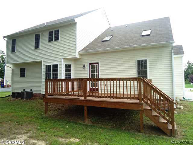 3925 Hazelnut Branch Road Midlothian, VA 23112 - Photo 14 of 15 a view of backyard with a deck
