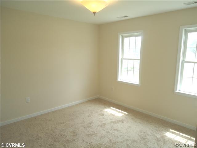 3925 Hazelnut Branch Road Midlothian, VA 23112 - Photo 8 of 15 an empty room with a window