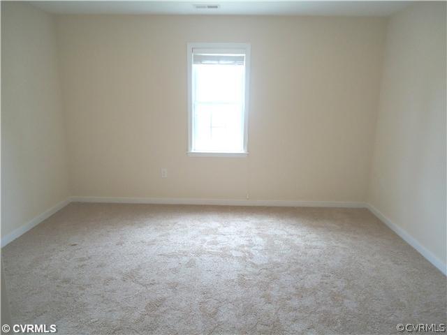 3925 Hazelnut Branch Road Midlothian, VA 23112 - Photo 9 of 15 a view of a room that has a window in it