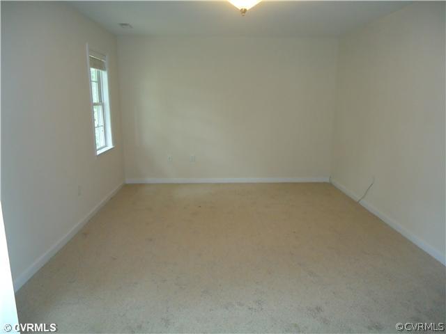 3925 Hazelnut Branch Road Midlothian, VA 23112 - Photo 10 of 15 an empty room with a window