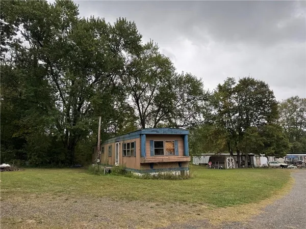a view of a house with a big yard