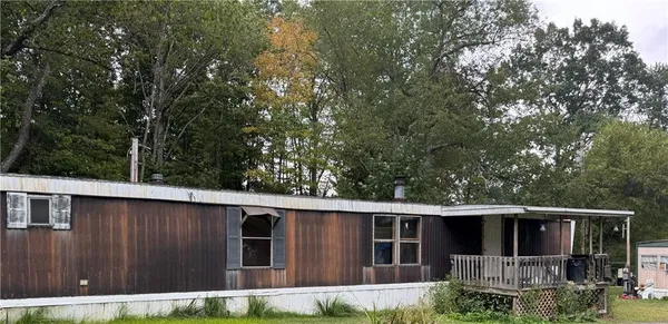 a house view with a backyard space