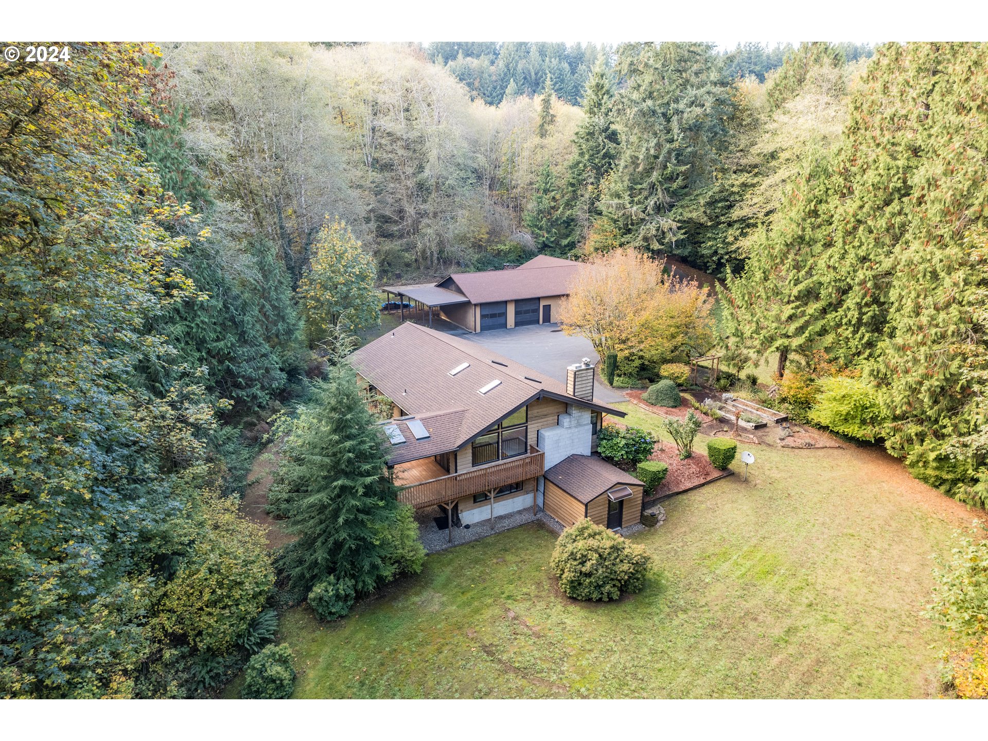 209 Car Road Longview, WA 98632 - Photo 1 of 40 an aerial view of a house with a yard basket ball court and outdoor seating