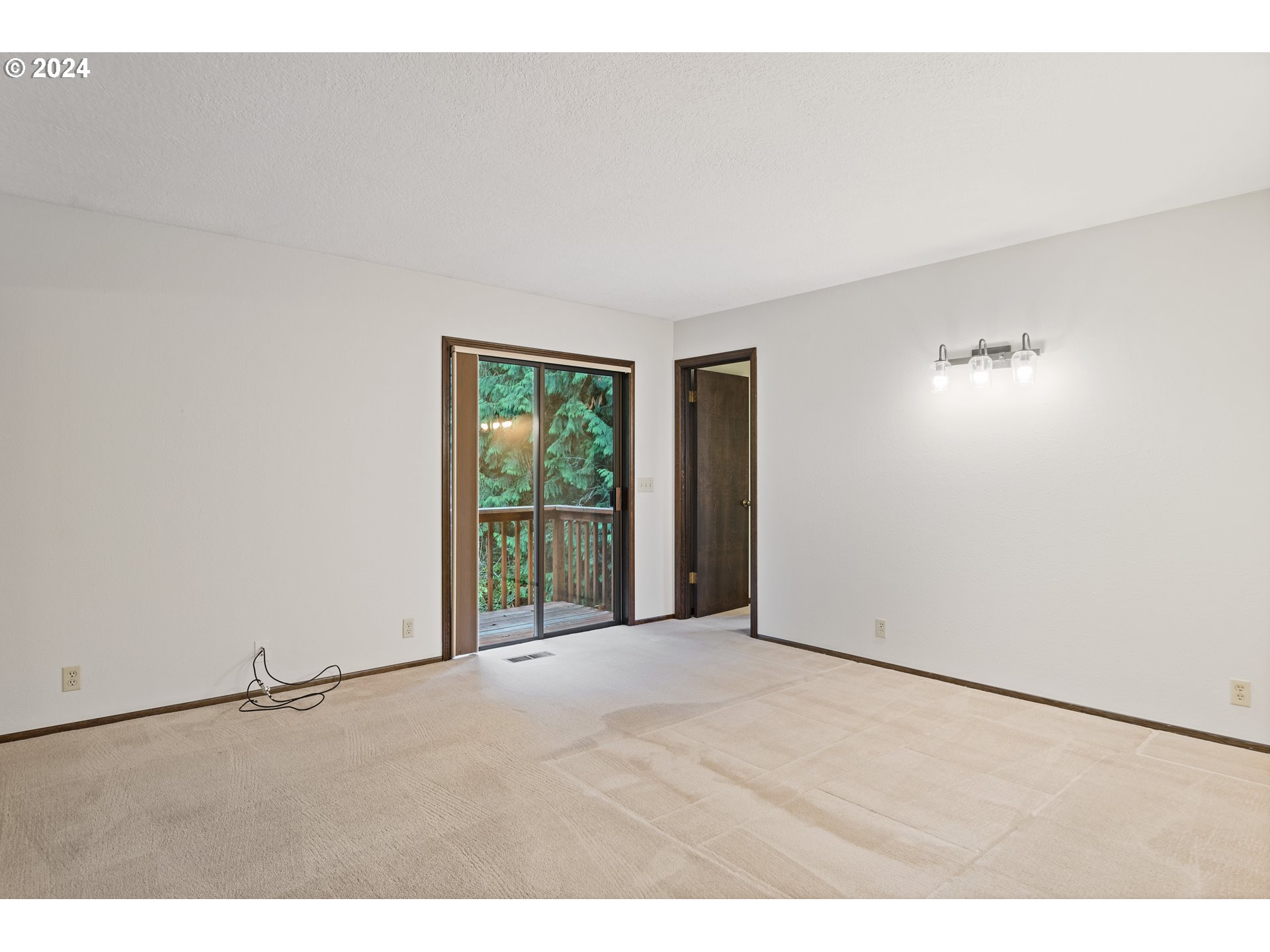 209 Car Road Longview, WA 98632 - Photo 14 of 40 a view of an empty room with a window