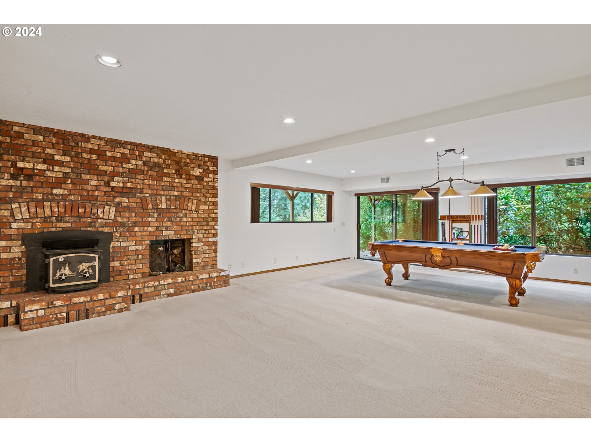 209 Car Road Longview, WA 98632 - Photo 24 of 40 a living room with furniture and a fireplace