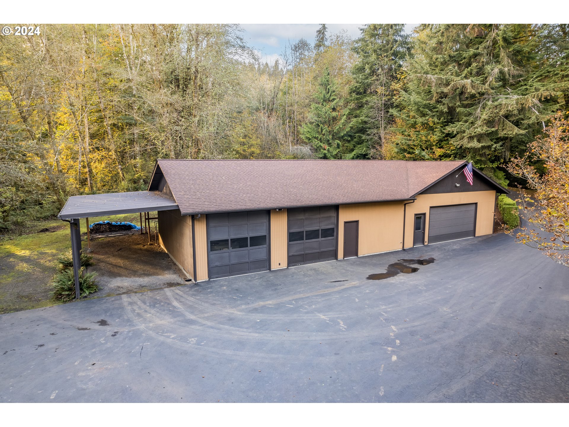 209 Car Road Longview, WA 98632 - Photo 34 of 40 a view of a house with a yard and sitting area