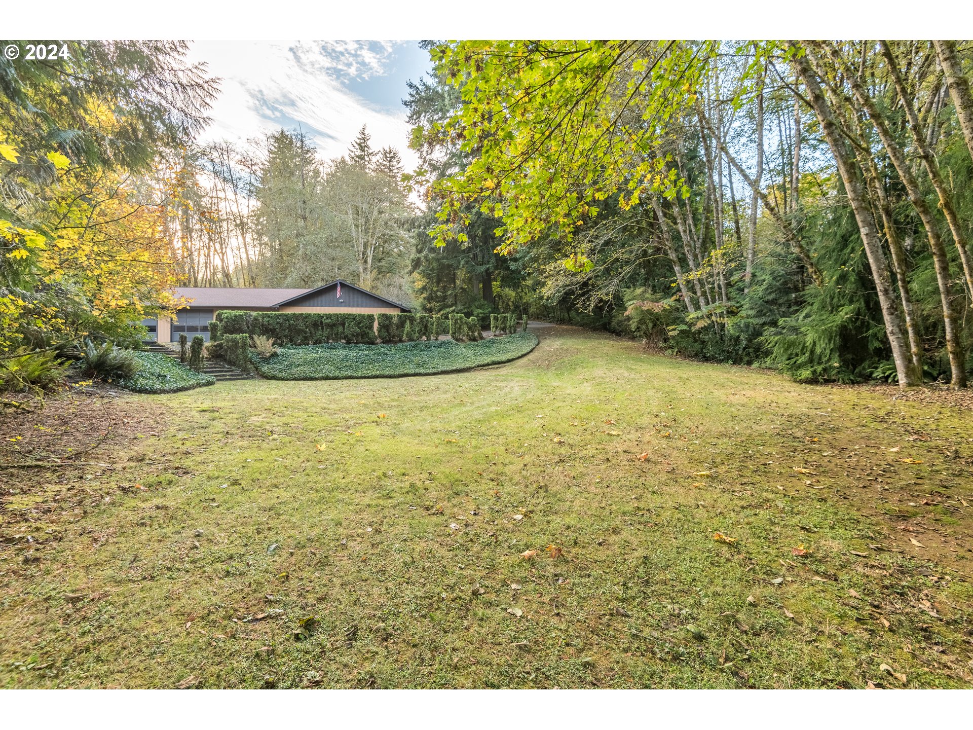 209 Car Road Longview, WA 98632 - Photo 39 of 40 a view of a yard with an outdoor space