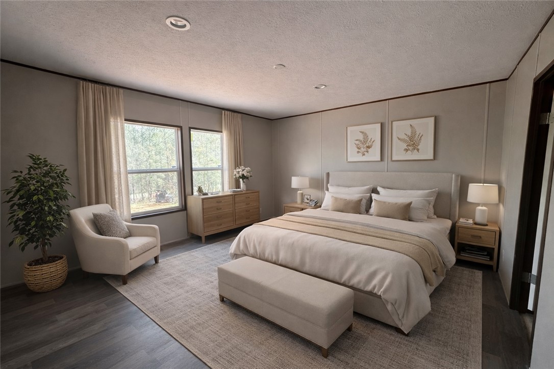 2949 High Shoals Road Anderson, SC 29624 - Photo 12 of 21 This primary bedroom offers ample natural light and a serene atmosphere for peaceful relaxation.