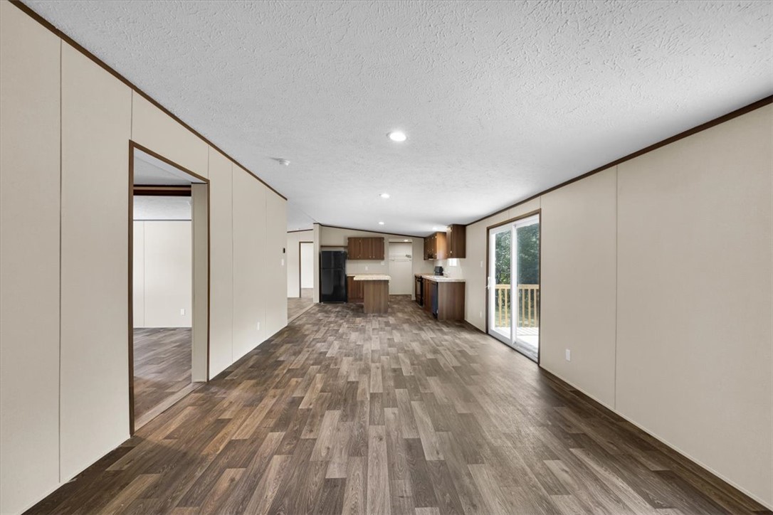 2949 High Shoals Road Anderson, SC 29624 - Photo 10 of 21 This inviting space features modern flooring and a seamless flow from the living area to the kitchen.